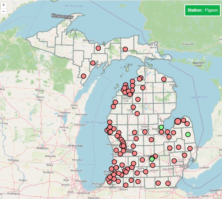 Map of Michigan with red and green circles scattered all over.